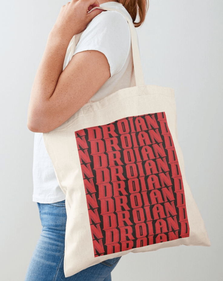 A tote back with the logo of Droian repeated on it.